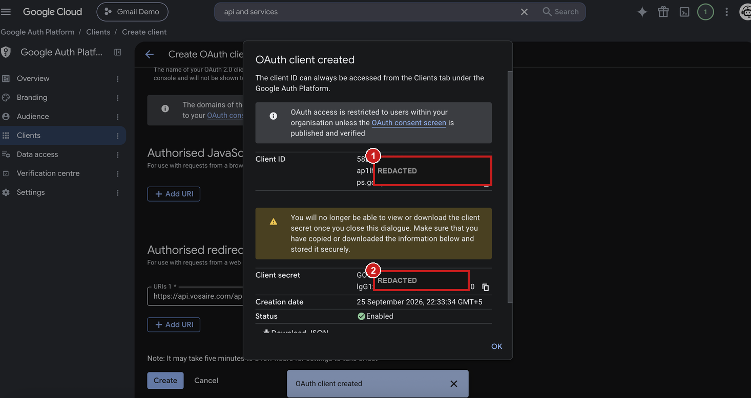 OAuth client created dialog with the Client ID and Client secret rows highlighted